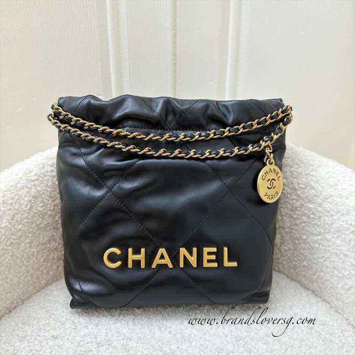 (Pre-loved) Chanel 22 Mini Hobo Handbag in Black Shiny Calfskin and AGHW